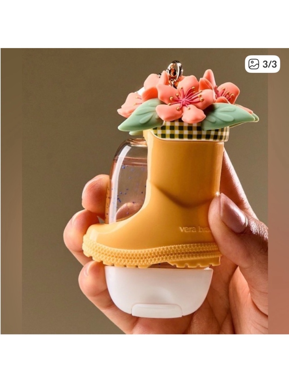 New Bath & Body Works Vera
Bradley yellow rain boot hand sanitizer holder